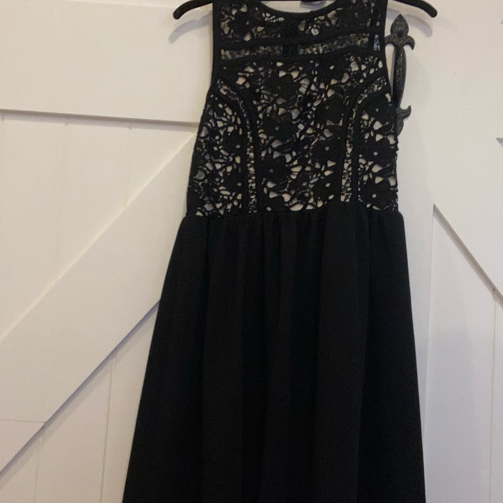Black dress with floral design on top half